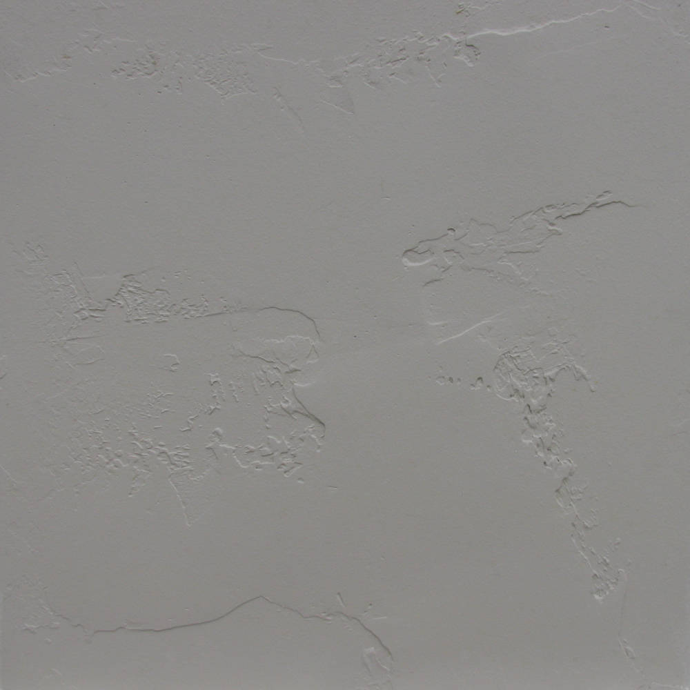 sample showing a 2x2 piece of drywall after its been textured with a hand texture, primed and painted.