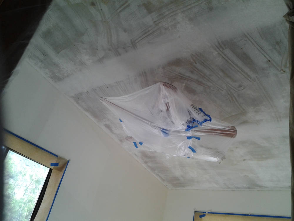 showing a ceiling after Popcorn Texture removal is done.