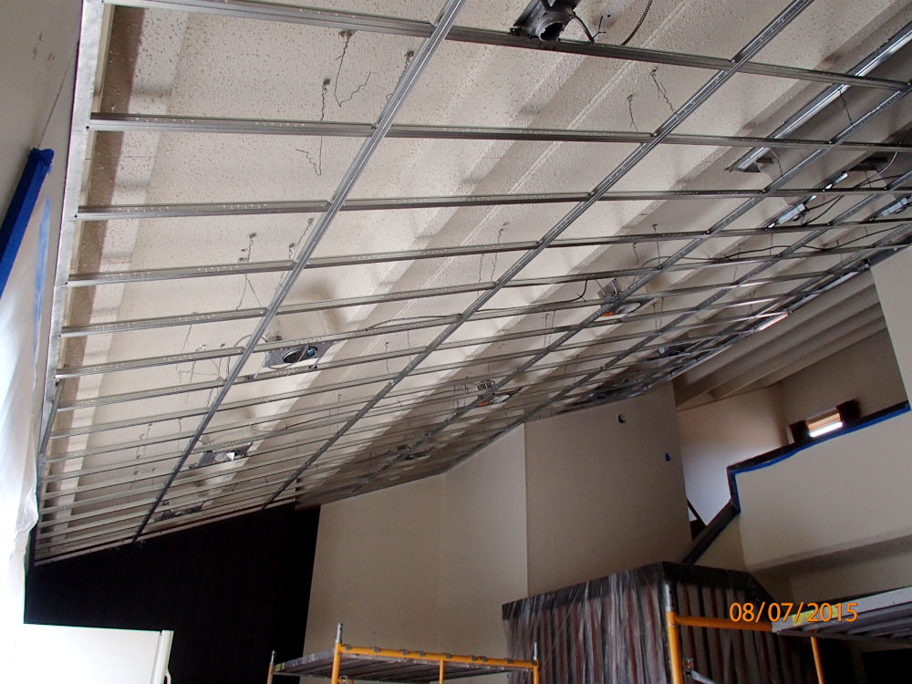 showing a ceiling with a grid x suspended ceiling installed.