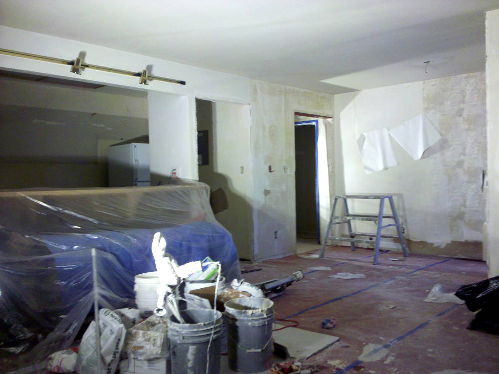 wallpaper removal in the kitchen and dining area.