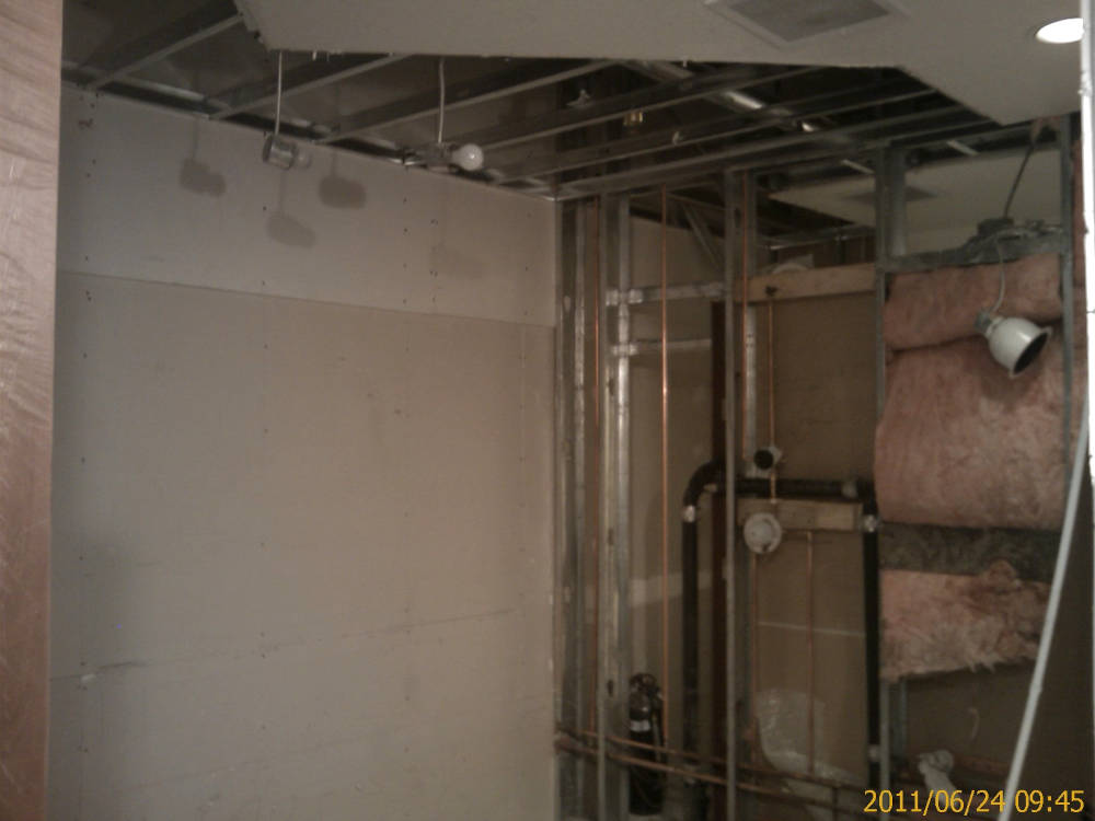 a bathroom remodel, texture change from knock
down to a custom drywall texture and framing of the ceiling