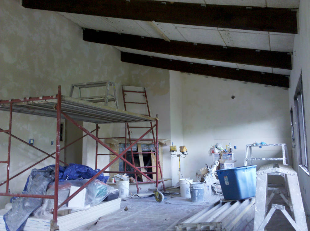 showing a condominium after it was re-textured using a skip trowel / hand texture.