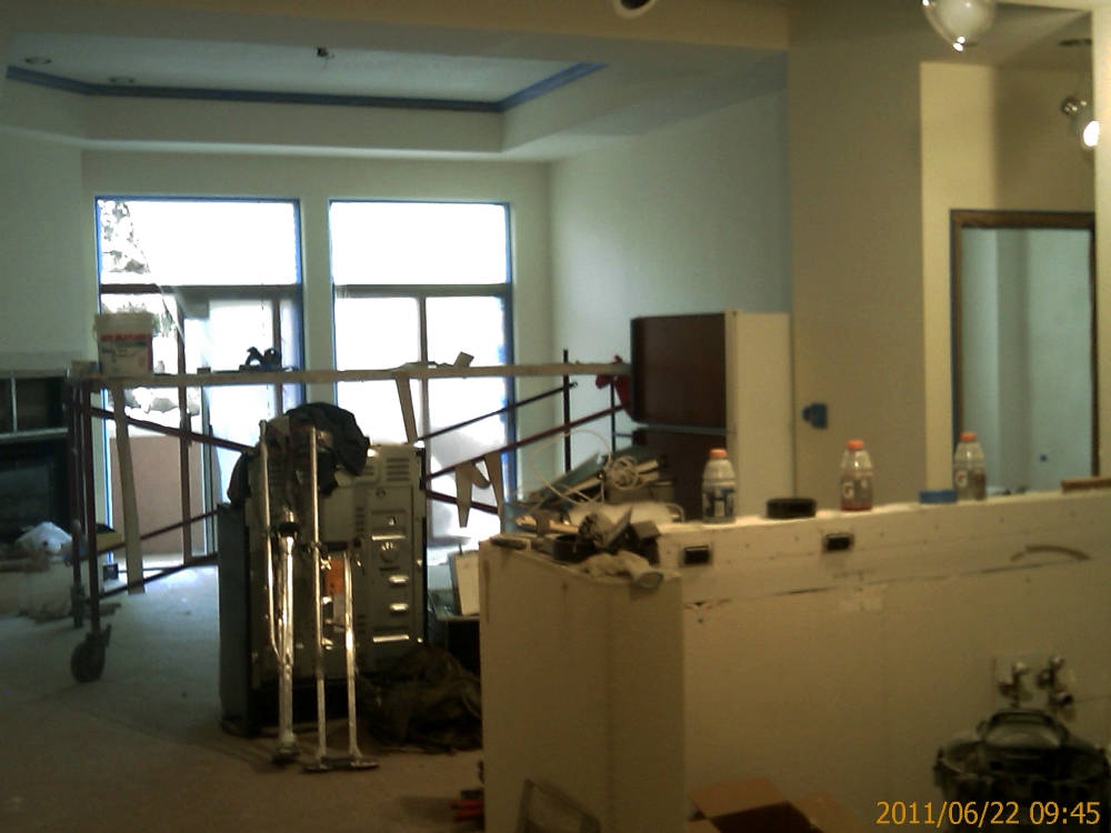 a condominium remodel, texture change from knock
down drywall texture to skip trowel / hand texture