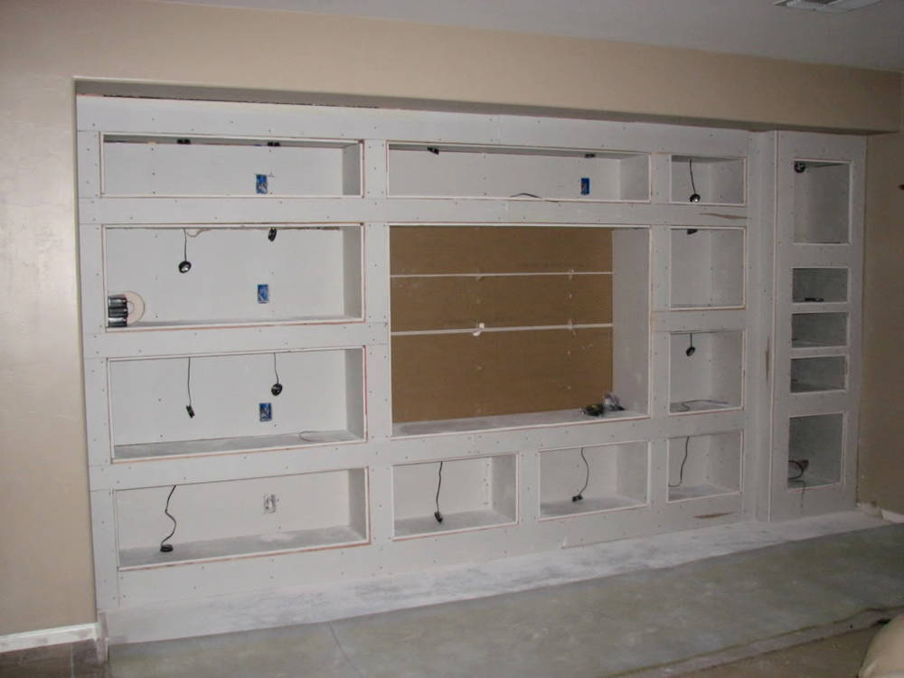 Custom entertainment center after
					the drywall have been installed.