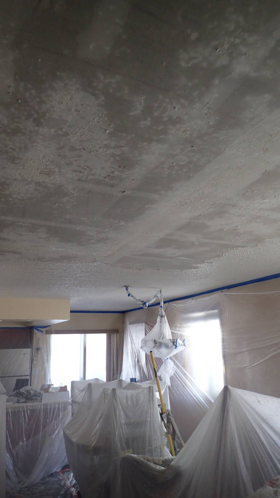 leaving room covered in plastic during popcorn ceiling removal