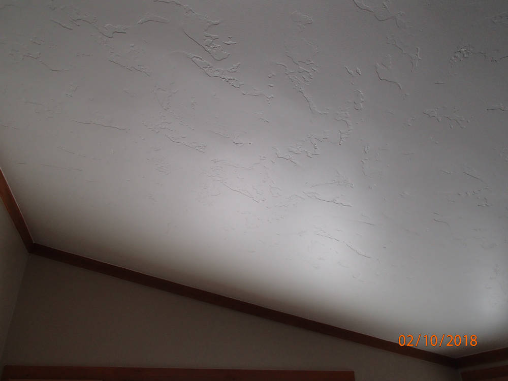 a ceiling with the Skip Trowel / Hand drywall texture.