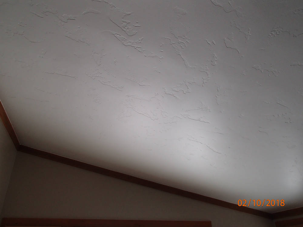 a ceiling with the Skip Trowel / Hand drywall texture.