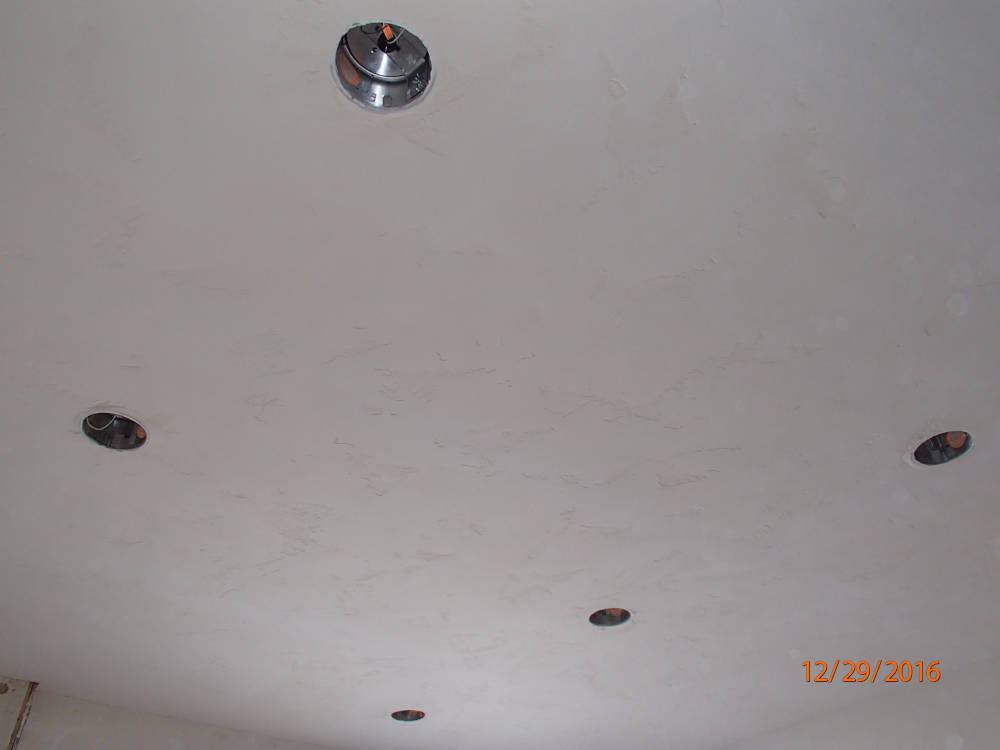 showing a ceiling after the skip trowel texture is done, ready for primer and paint.