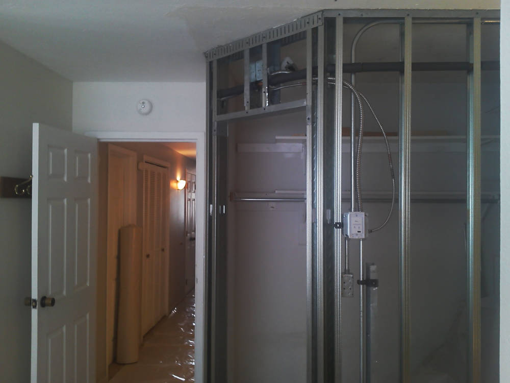 brand new closet framed with steel stud framing, ready for drywall installation.