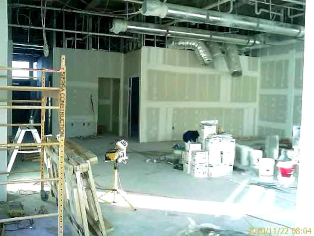 a restaurant showing the bare drywall after
installation, and no ceilings